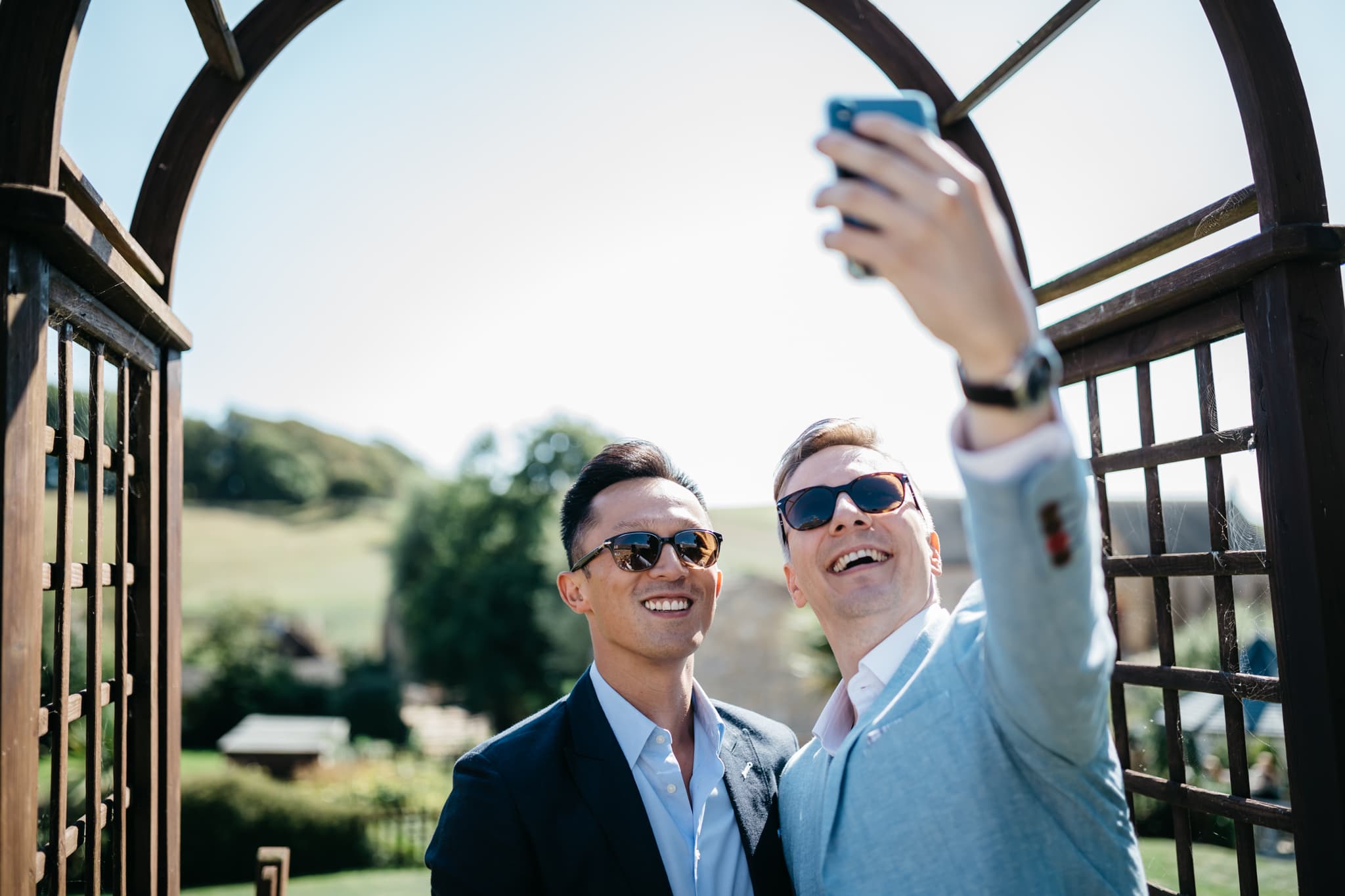 Guests at wedding taking selfie