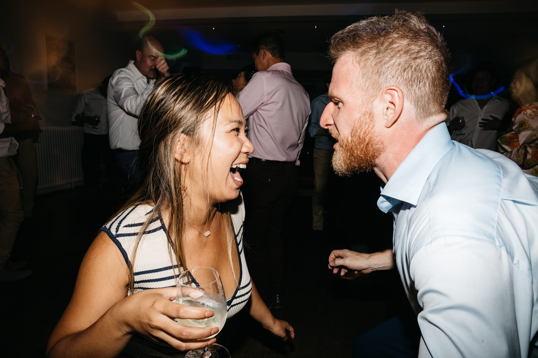 Groom and friend dancing